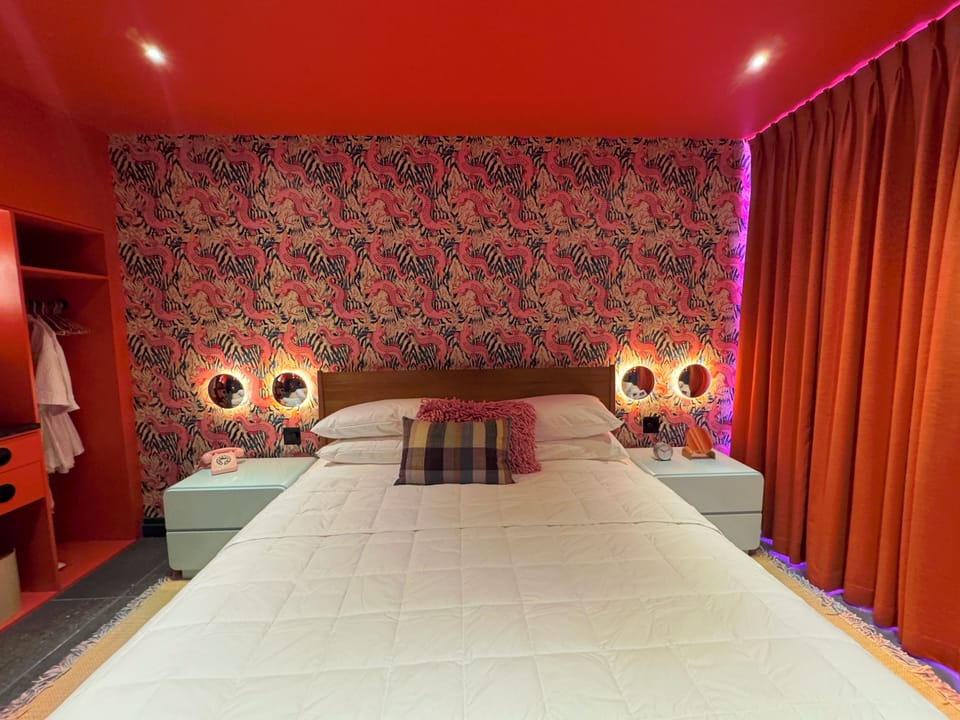 Premium bedding, blackout drapes, iron/ironing board, free WiFi