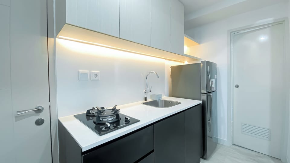 Standard Apartment | Private kitchen | Stovetop, rice cooker