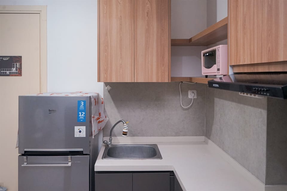 Standard Apartment | Private kitchen | Fridge, stovetop