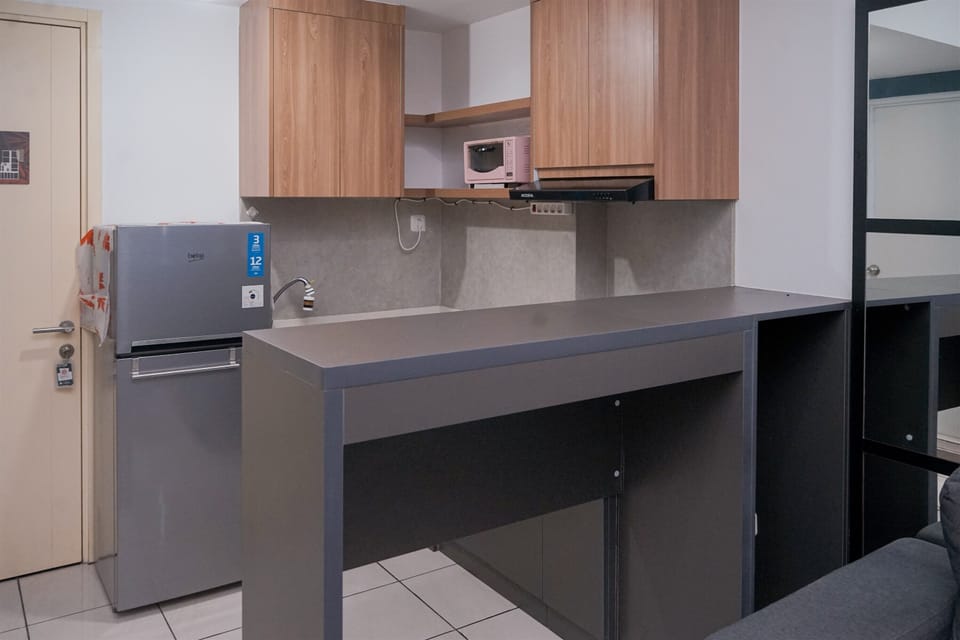 Standard Apartment | Private kitchen | Fridge, stovetop
