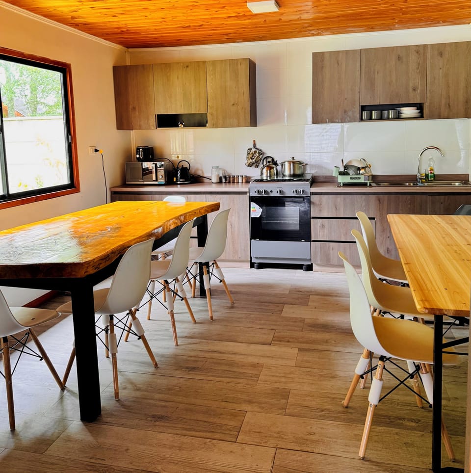 Full-size fridge, microwave, toaster, cleaning supplies