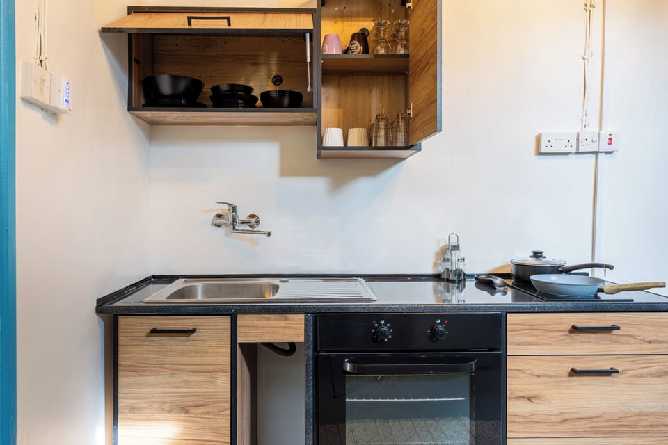 House, City View, Garden Area | Private kitchen | Coffee/tea maker, full-size fridge, oven, stovetop