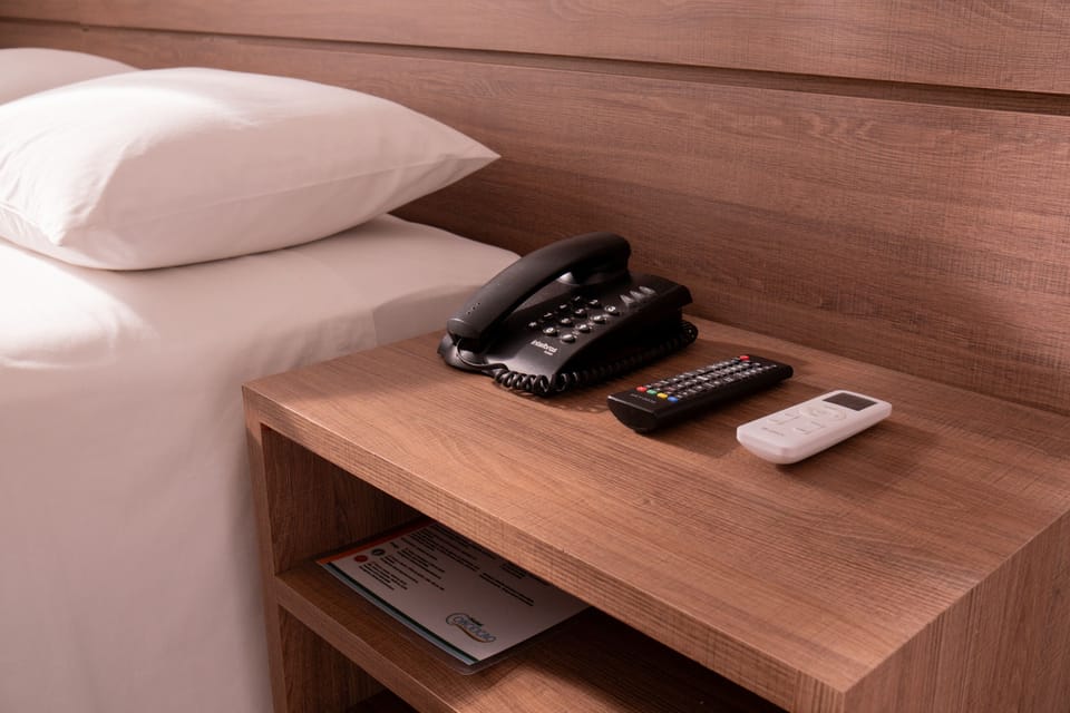 Desk, laptop workspace, free WiFi, bed sheets