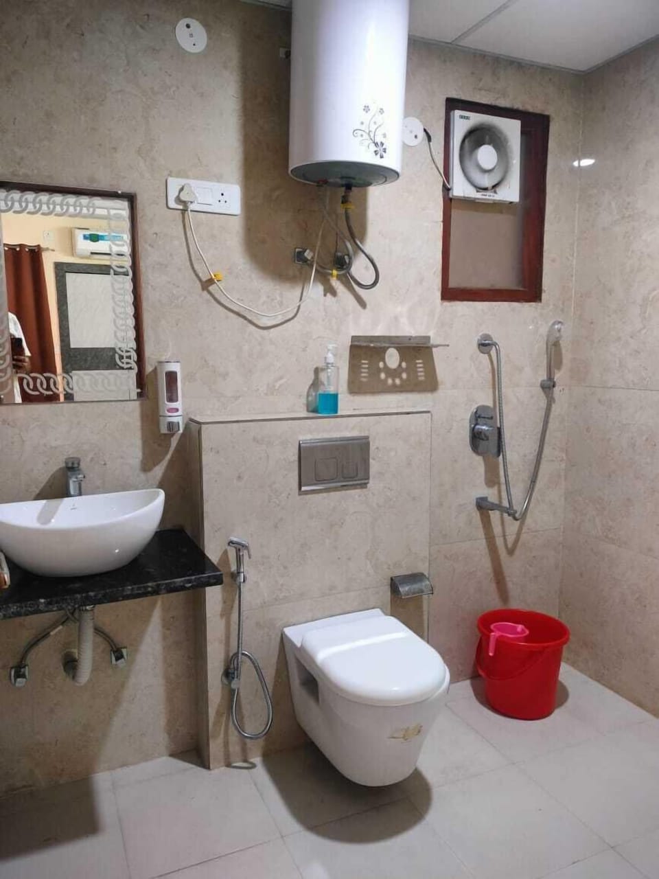 Shower, slippers, bidet, towels