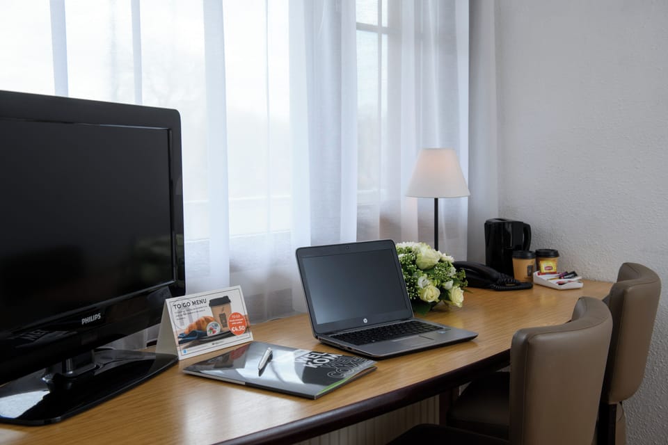 Desk, blackout drapes, iron/ironing board, free WiFi