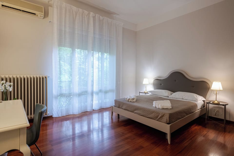 Triple Room, Garden View | Desk, laptop workspace, iron/ironing board, free WiFi