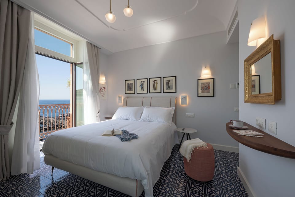 Deluxe Room, Balcony, Sea View | In-room safe, soundproofing, free WiFi, bed sheets