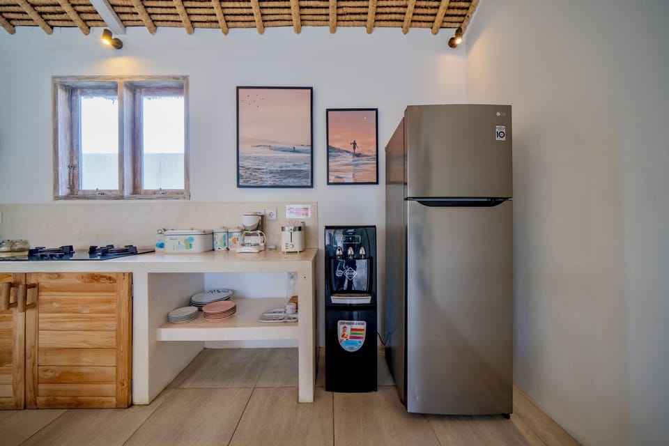 Deluxe Villa, Patio, Pool View | Private kitchen | Fridge, microwave, stovetop, electric kettle