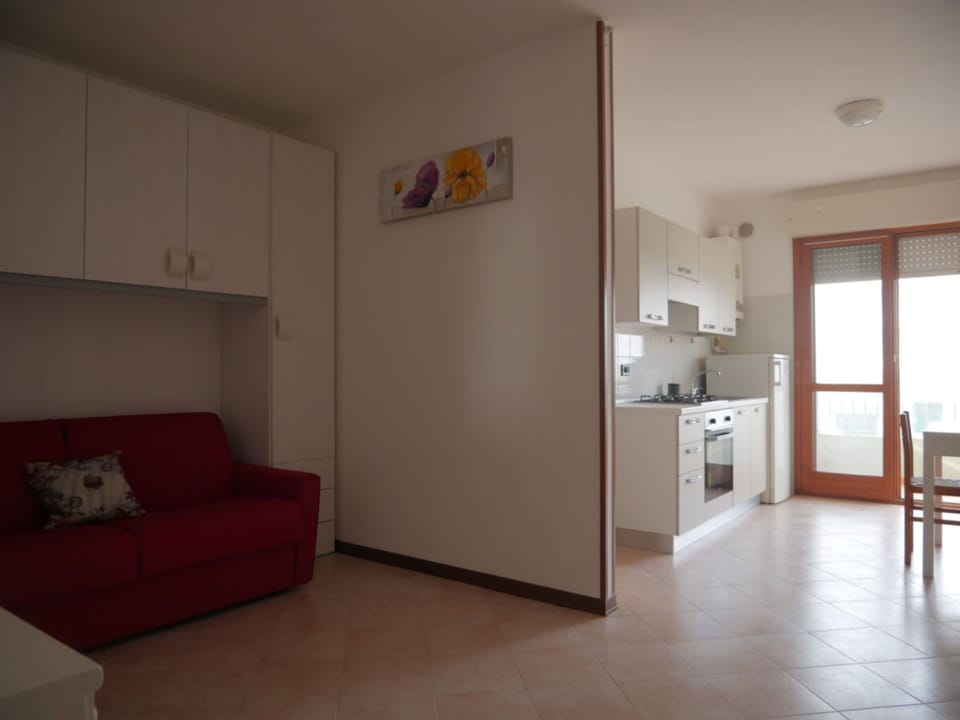 Studio, Multiple Bedrooms, Balcony, City View | Living room
