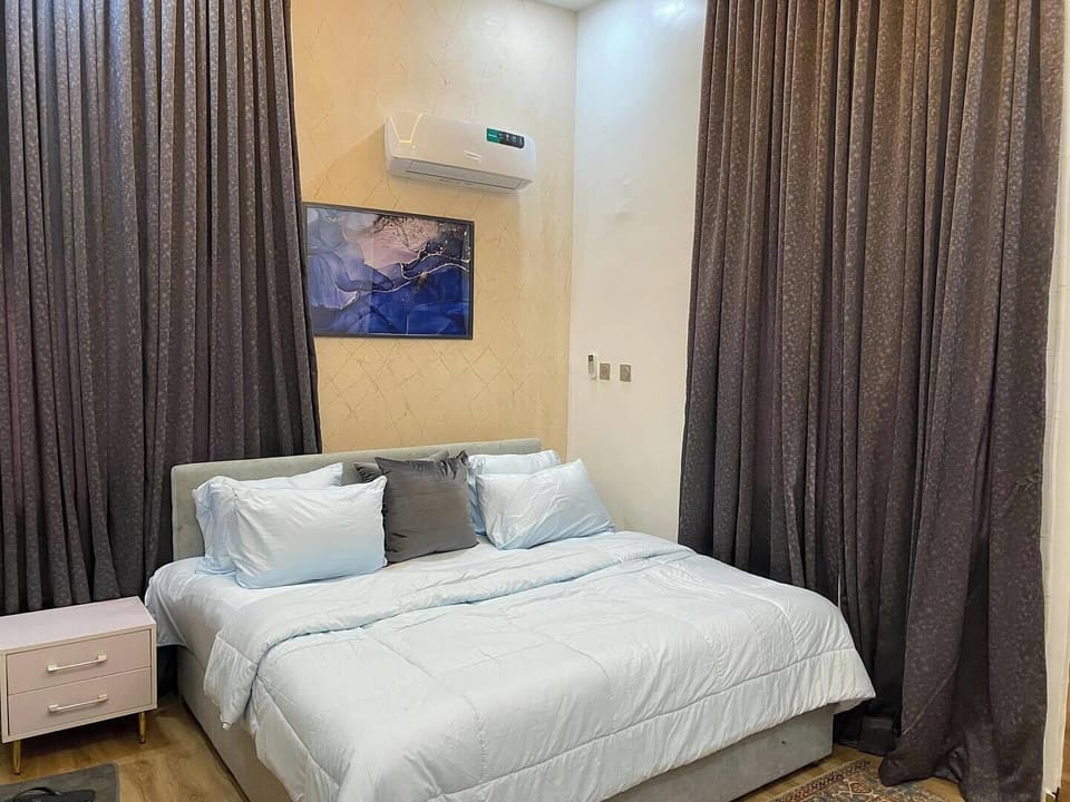 Economy Room, Balcony, City View | Desk, laptop workspace, blackout drapes, soundproofing