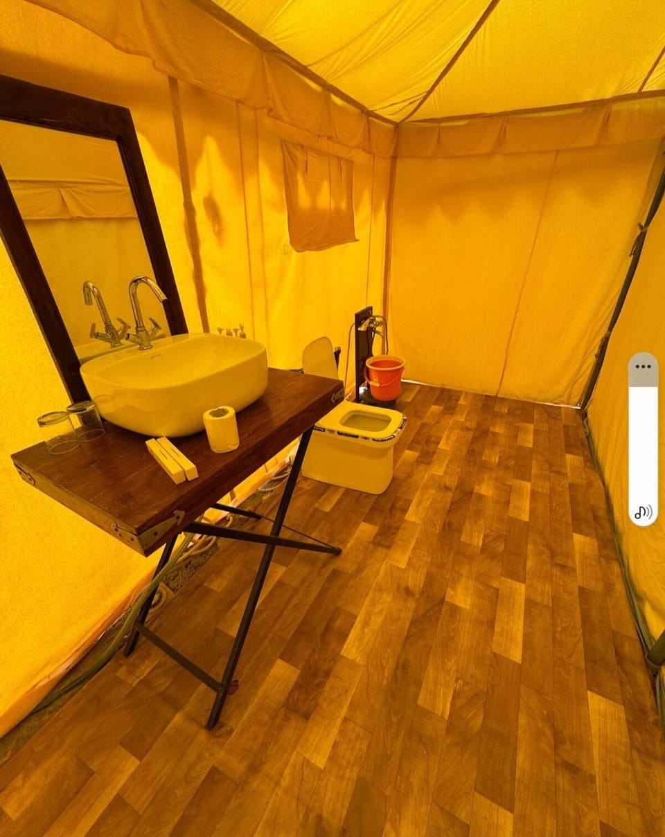 Deluxe Tent, Balcony, Hill View | Bathroom | Free toiletries, towels, soap, shampoo