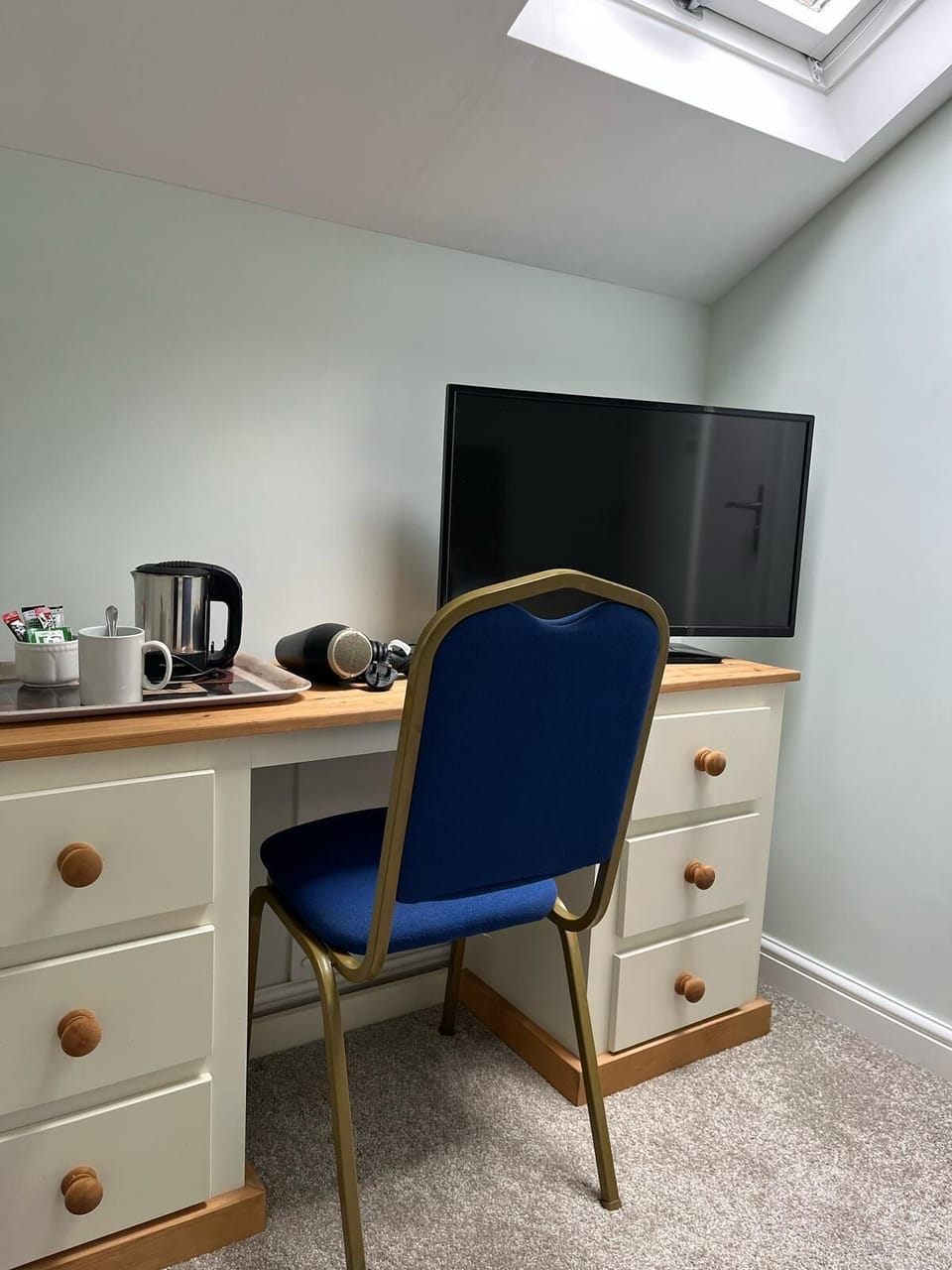 Hypo-allergenic bedding, desk, laptop workspace, iron/ironing board