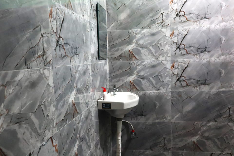 Deluxe Double Room, Smoking, Balcony | Bathroom | Shower, slippers, towels, soap