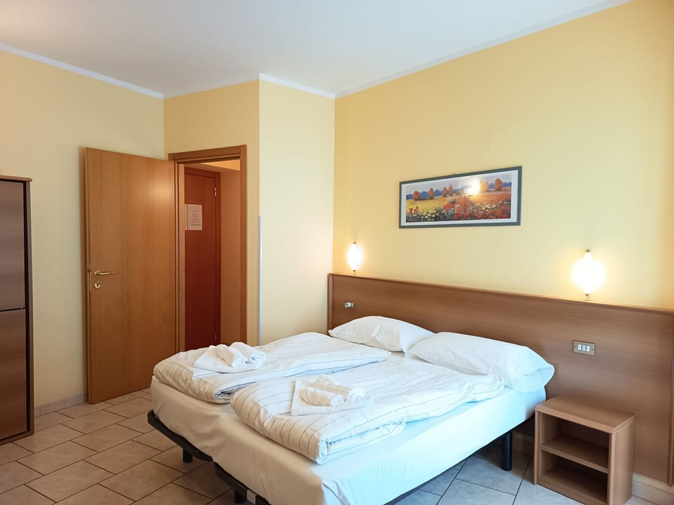 Premium bedding, down comforters, pillowtop beds, in-room safe