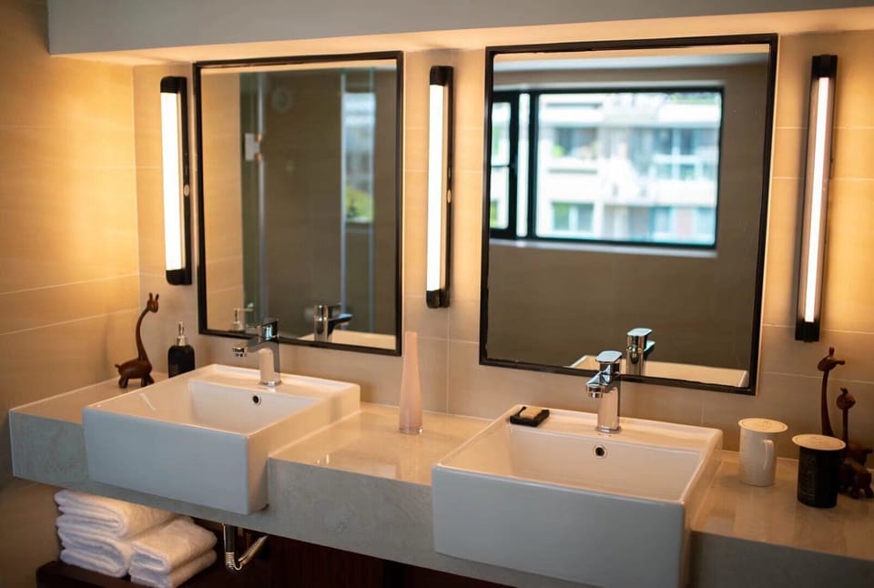 Family Triple Room | Bathroom | Shower, rainfall showerhead, hair dryer, bathrobes
