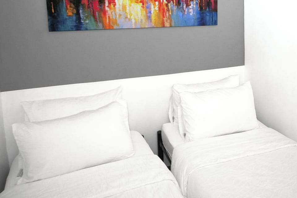 Deluxe Twin Room | Laptop workspace, iron/ironing board, free WiFi