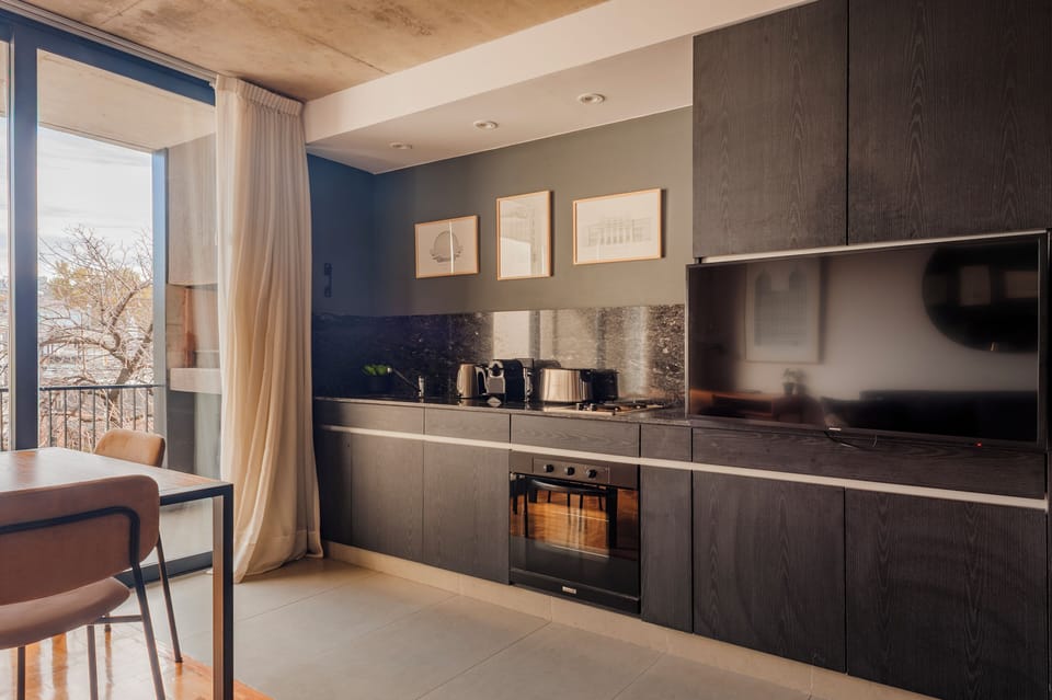 Comfort Studio, Balcony, City View | Private kitchen | Coffee/tea maker, electric kettle