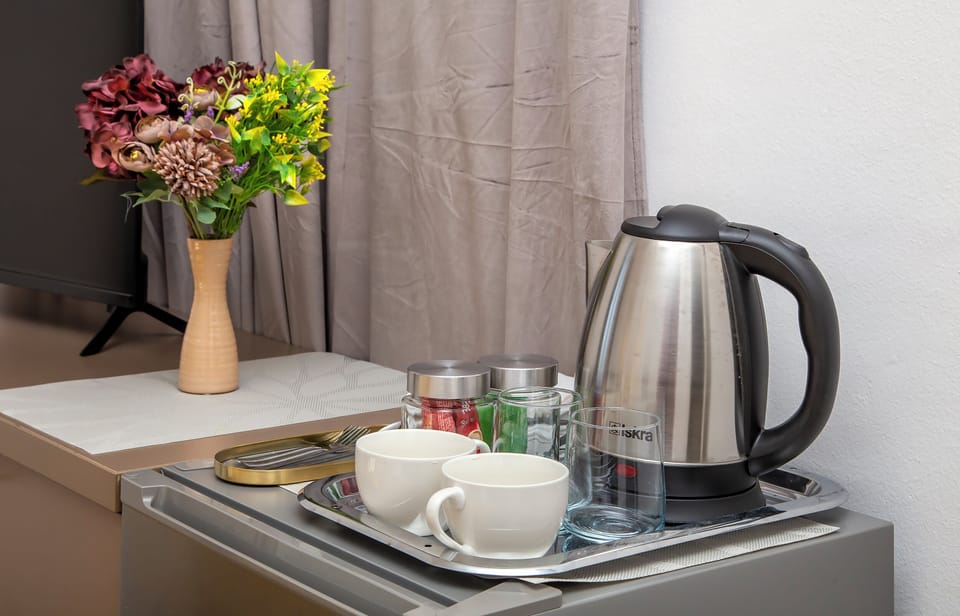 Deluxe Room, Sea View | Coffee and/or coffee maker