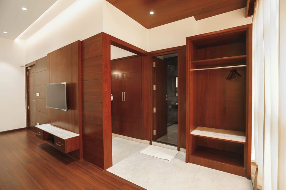 Luxury Suite | Premium bedding, laptop workspace, WiFi (free), individually furnished