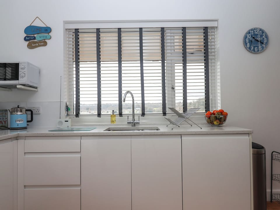 Fridge, dishwasher, electric kettle, cookware/dishes/utensils