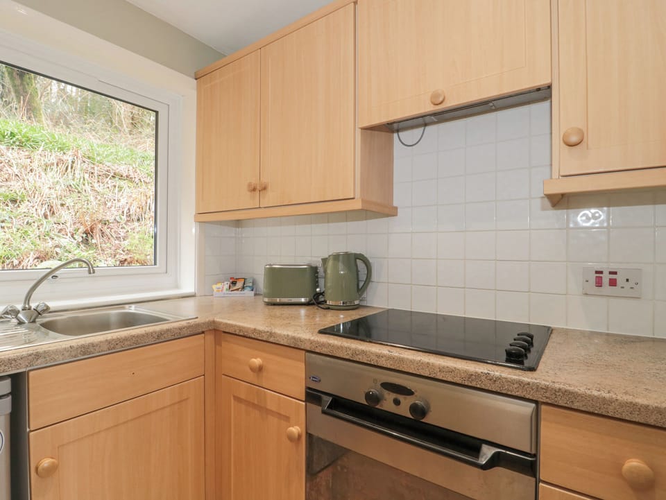 Fridge, electric kettle, toaster, cookware/dishes/utensils