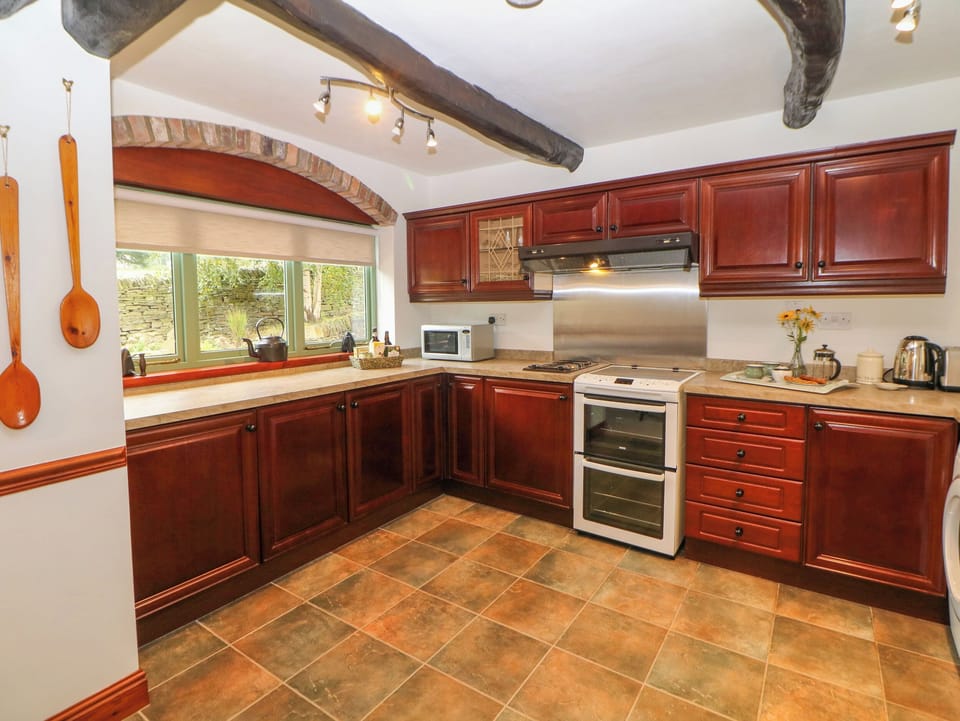 Fridge, electric kettle, cookware/dishes/utensils