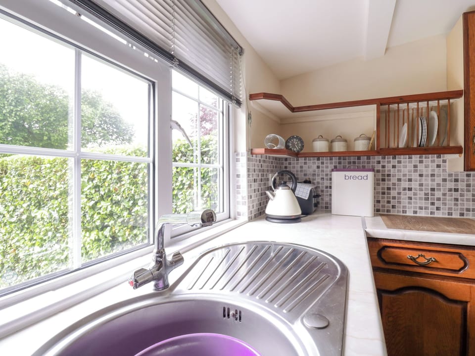 Fridge, electric kettle, toaster, cookware/dishes/utensils