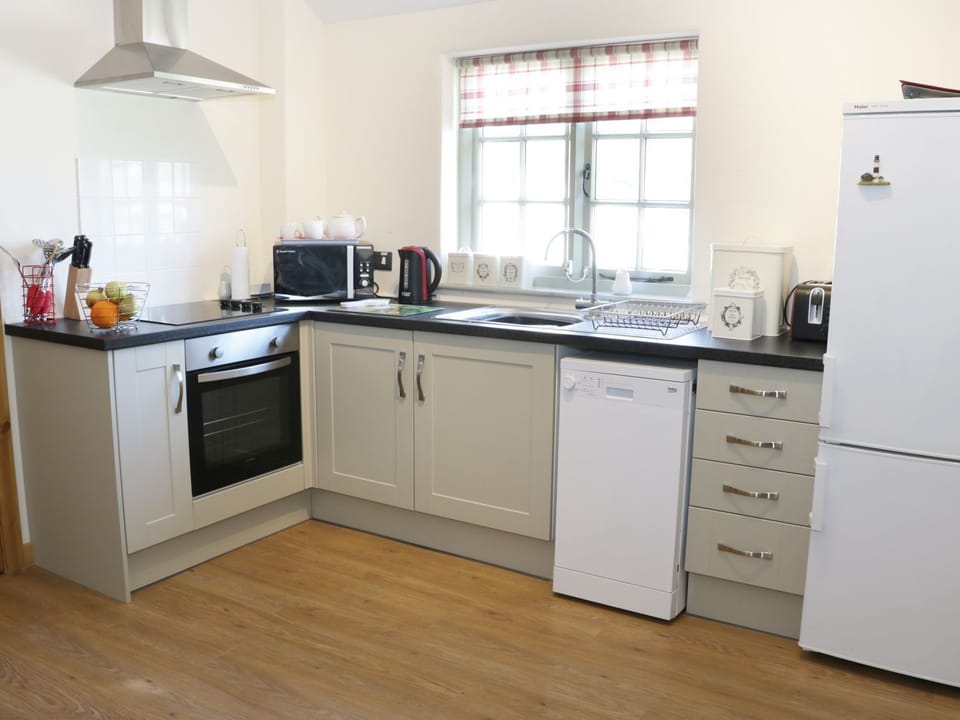 Fridge, dishwasher, electric kettle, cookware/dishes/utensils