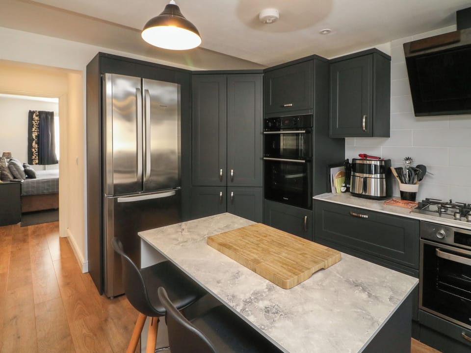 Fridge, electric kettle, toaster, cookware/dishes/utensils