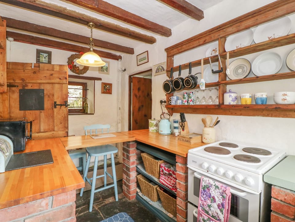 Fridge, electric kettle, toaster, cookware/dishes/utensils
