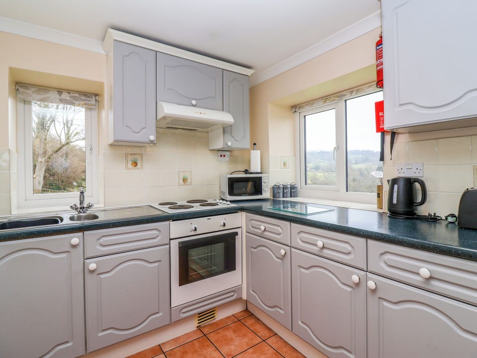 Fridge, electric kettle, cookware/dishes/utensils