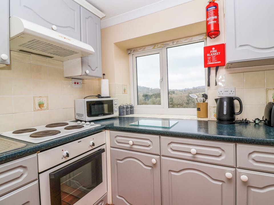 Fridge, electric kettle, cookware/dishes/utensils