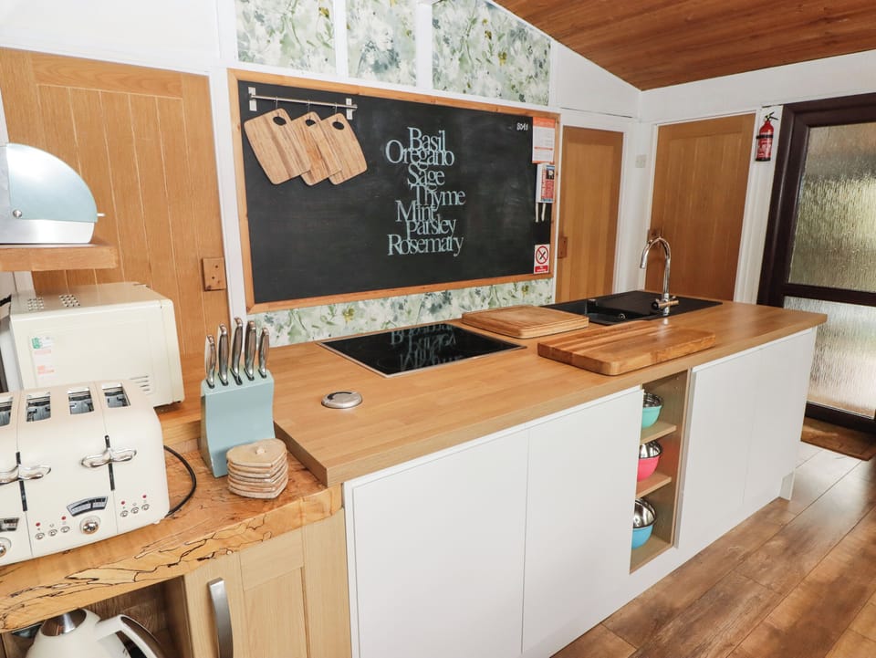 Fridge, electric kettle, toaster, cookware/dishes/utensils