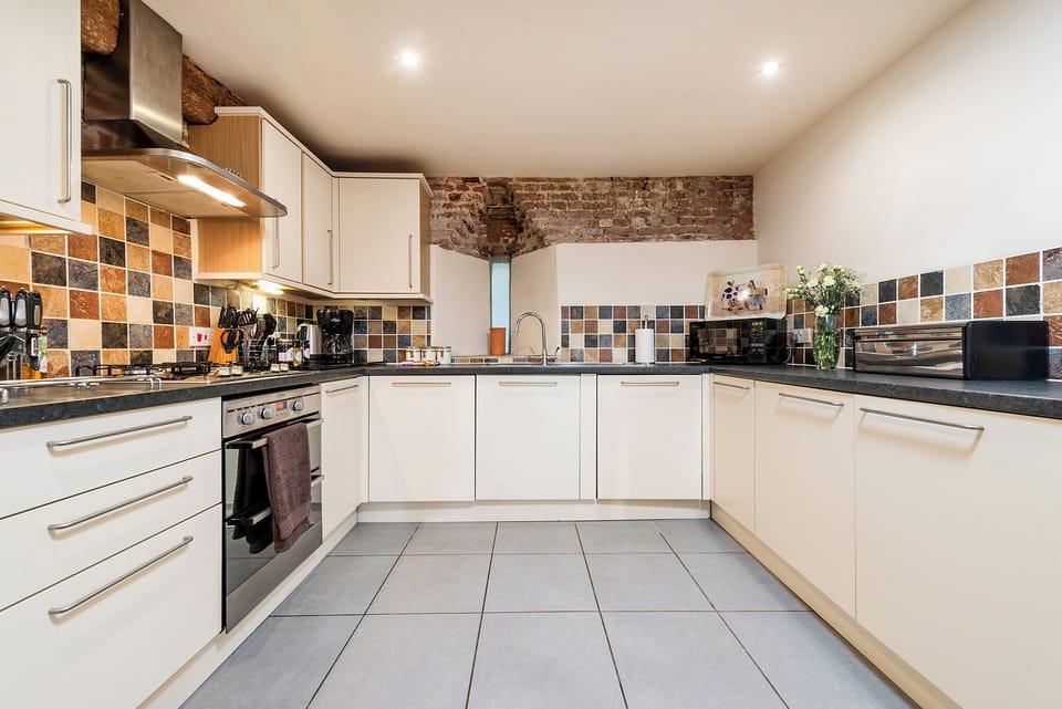 Fridge, dishwasher, electric kettle, cookware/dishes/utensils