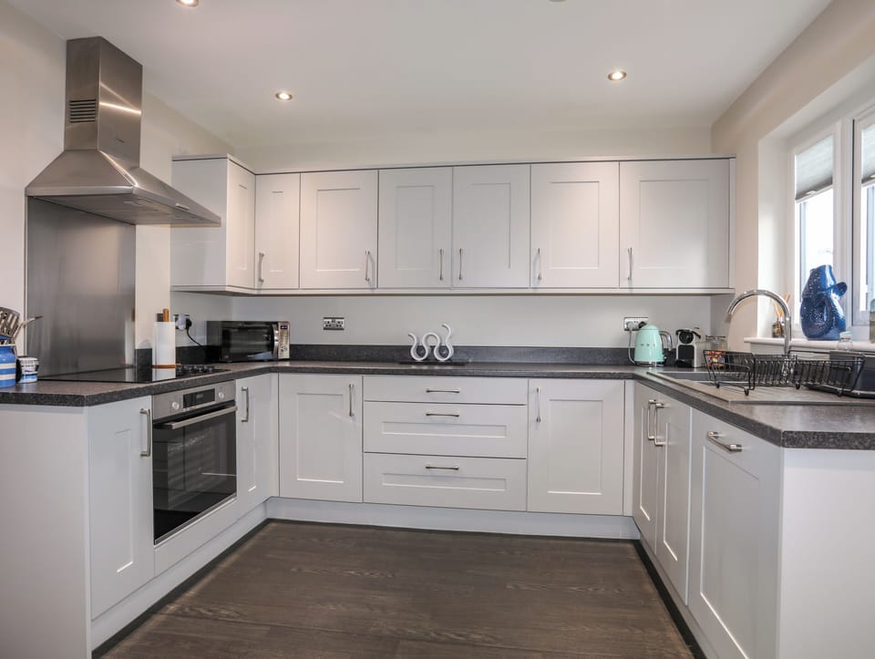 Fridge, dishwasher, electric kettle, cookware/dishes/utensils