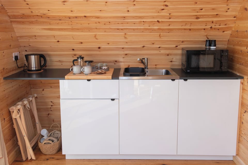 Fridge, electric kettle, cookware/dishes/utensils