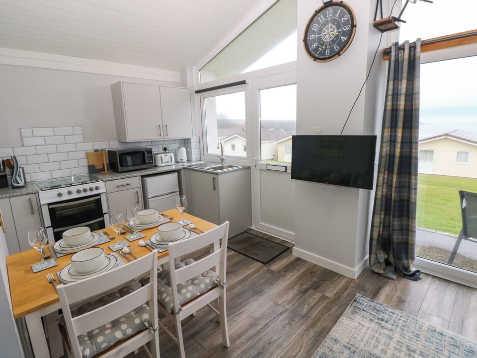 Fridge, electric kettle, toaster, cookware/dishes/utensils