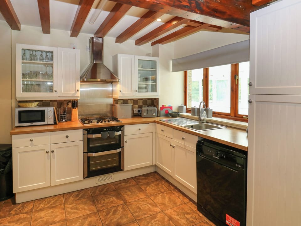 Fridge, electric kettle, toaster, cookware/dishes/utensils