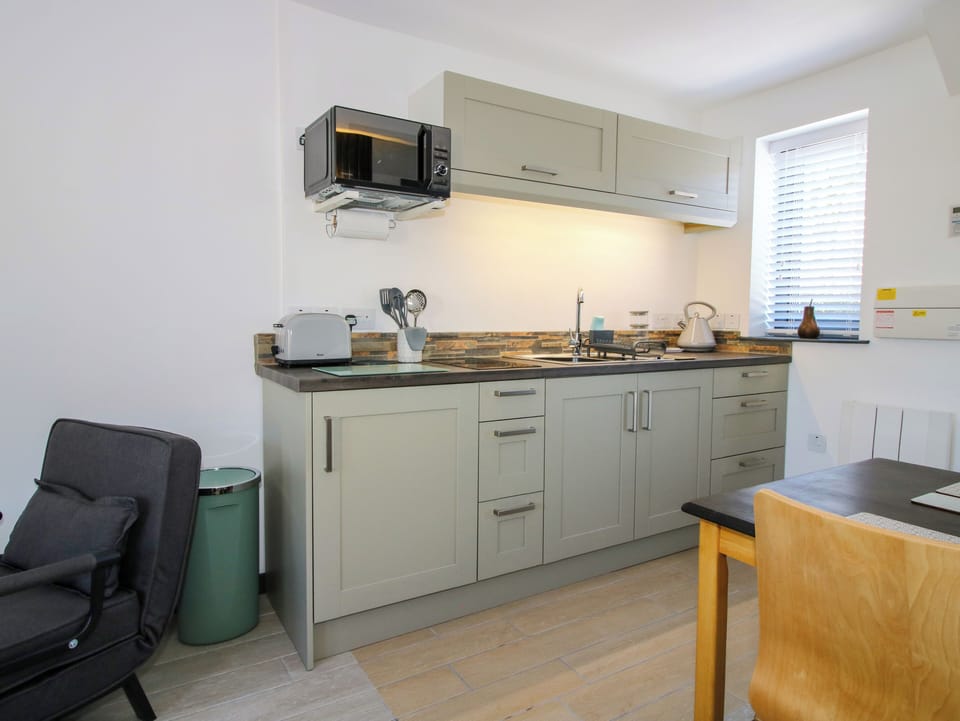 Fridge, electric kettle, toaster, cookware/dishes/utensils