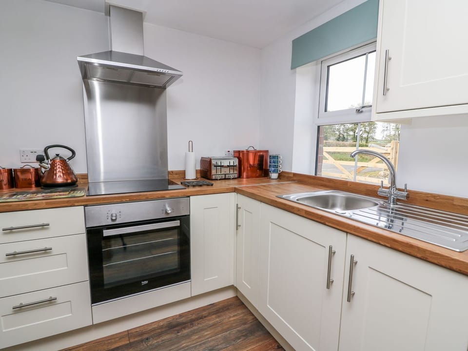Fridge, electric kettle, toaster, cookware/dishes/utensils