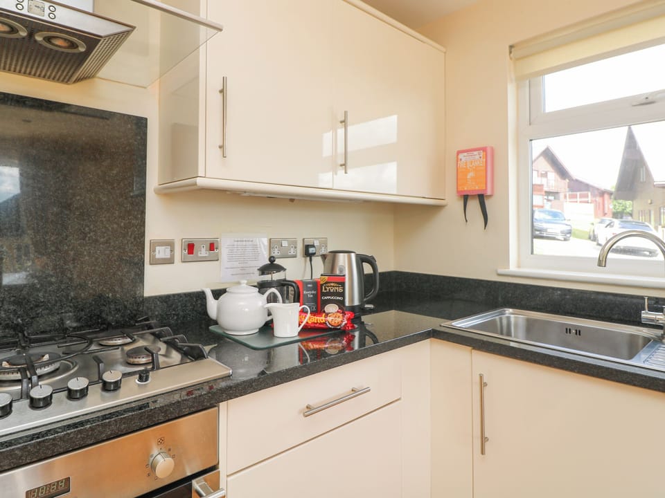 Fridge, dishwasher, cookware/dishes/utensils