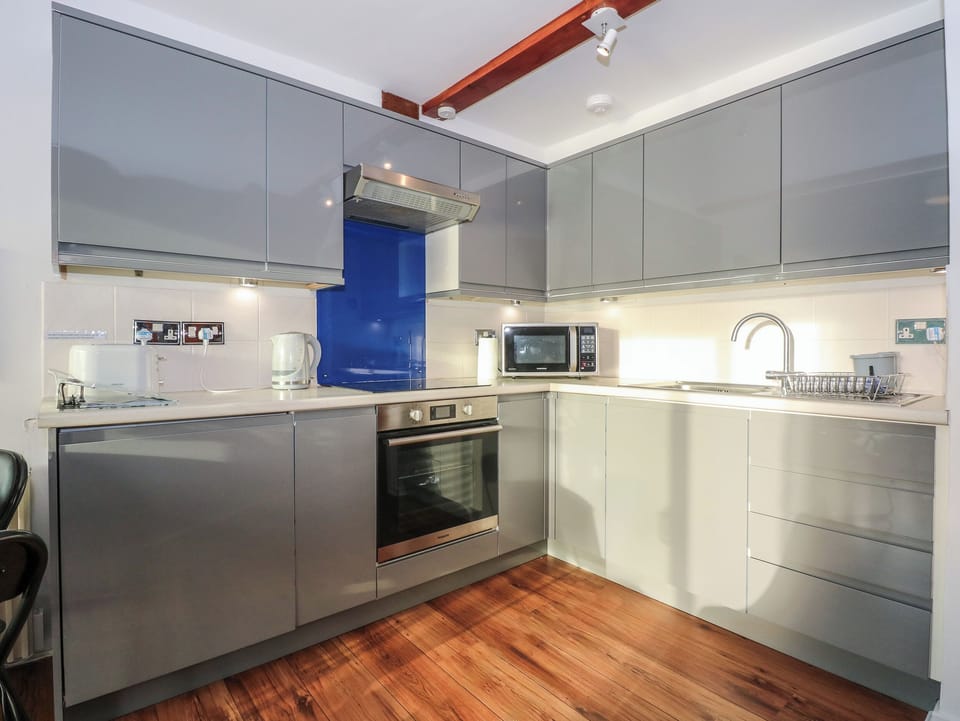 Fridge, electric kettle, toaster, cookware/dishes/utensils