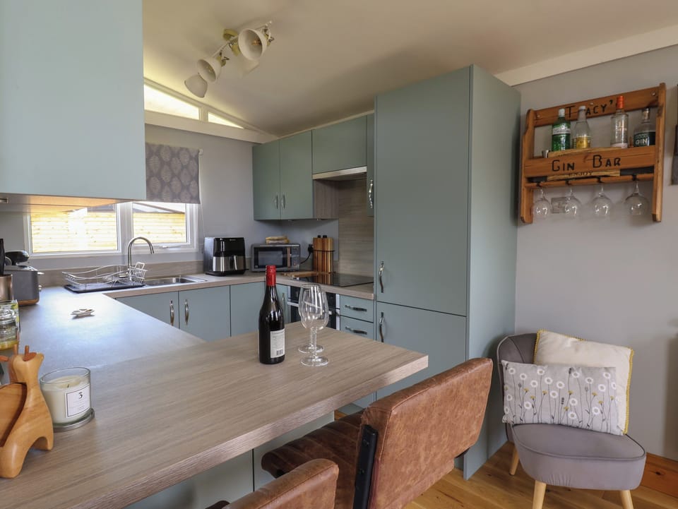 Fridge, electric kettle, toaster, cookware/dishes/utensils