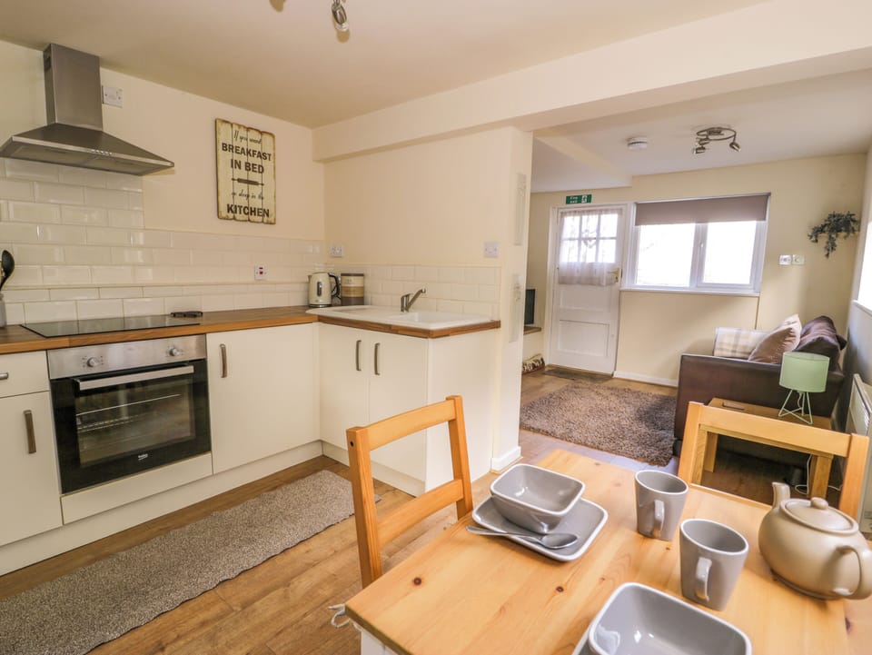 Fridge, electric kettle, toaster, cookware/dishes/utensils