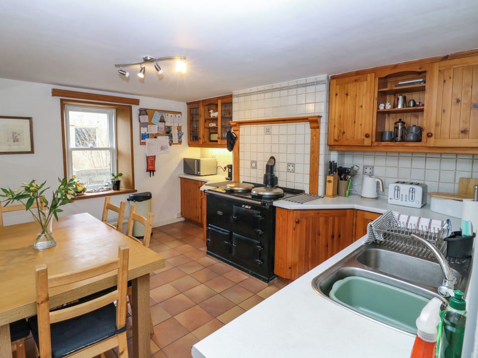 Fridge, electric kettle, toaster, cookware/dishes/utensils