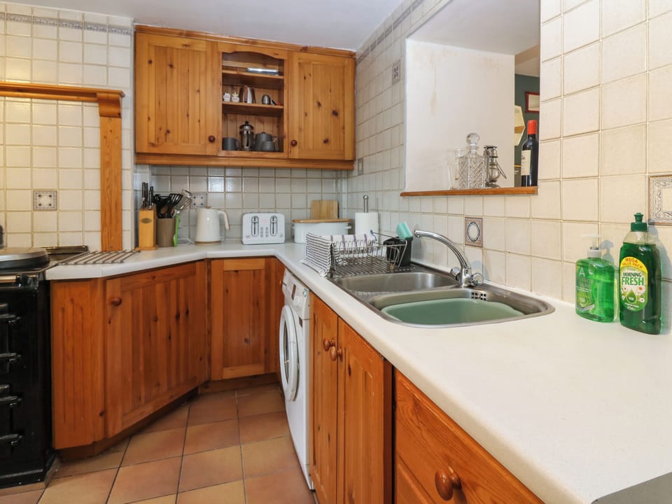 Fridge, electric kettle, toaster, cookware/dishes/utensils