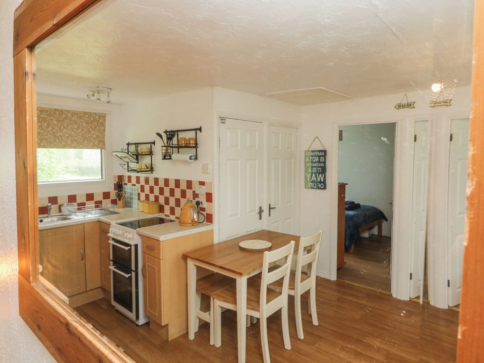 Fridge, electric kettle, toaster, cookware/dishes/utensils