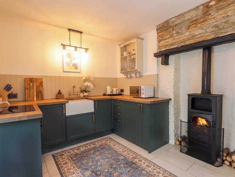 Fridge, electric kettle, toaster, cookware/dishes/utensils