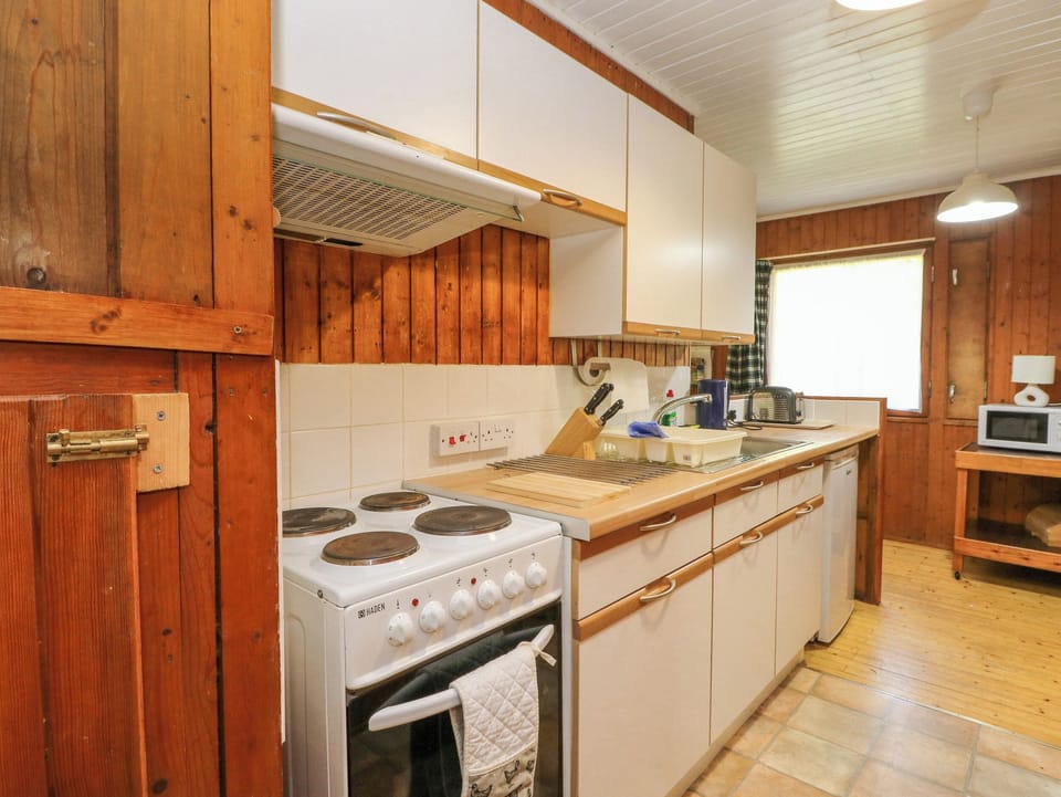 Fridge, electric kettle, toaster, cookware/dishes/utensils