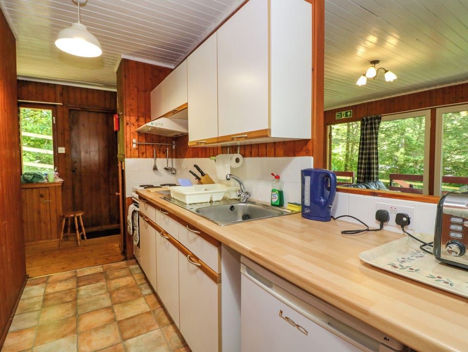 Fridge, electric kettle, toaster, cookware/dishes/utensils